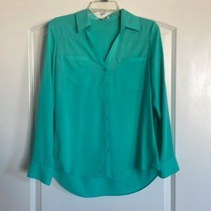 Simple turquoise button down dress shirt and with breast pockets, size medium